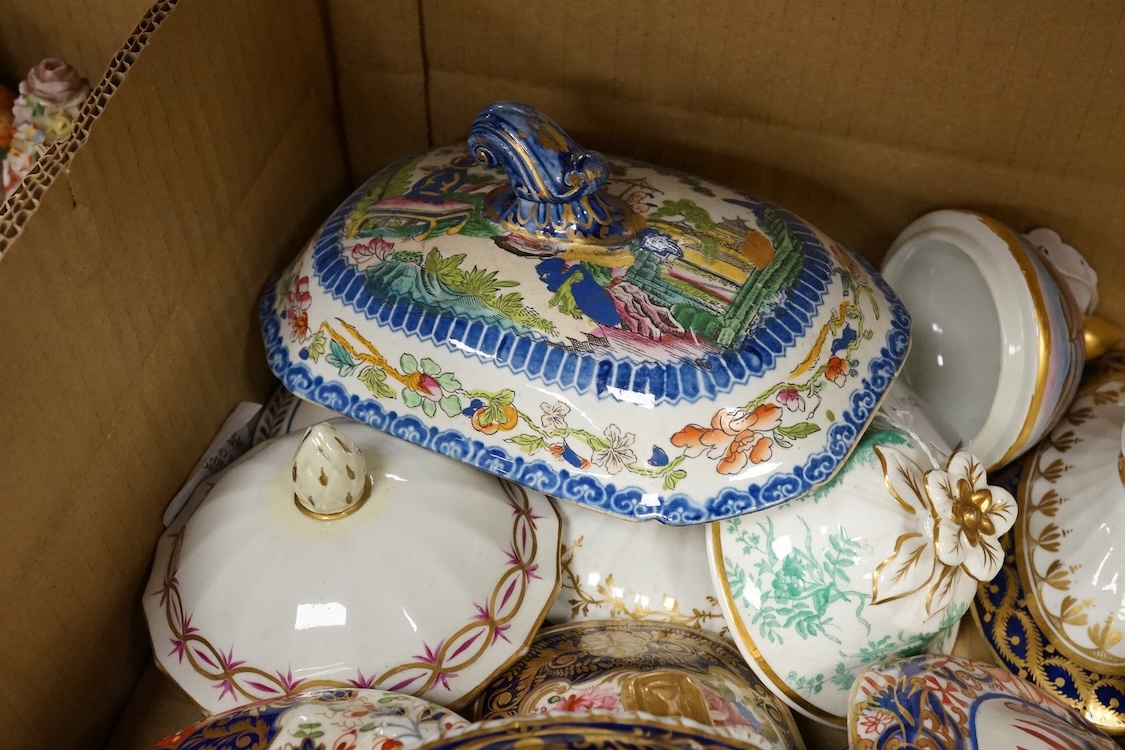 A collection of porcelain tureen and pot covers, largely 19th century